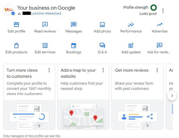 Business owner optimizing a Google Business Profile with reviews, photos, services, and business information.
